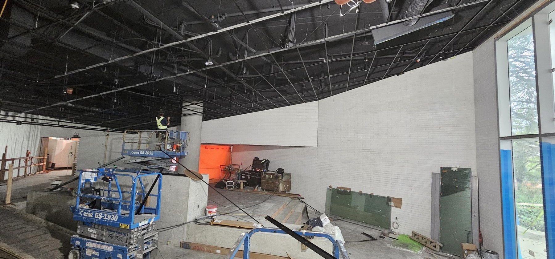 School of Biomedical Engineering, UBC Sloped black grid install for wood ceilings