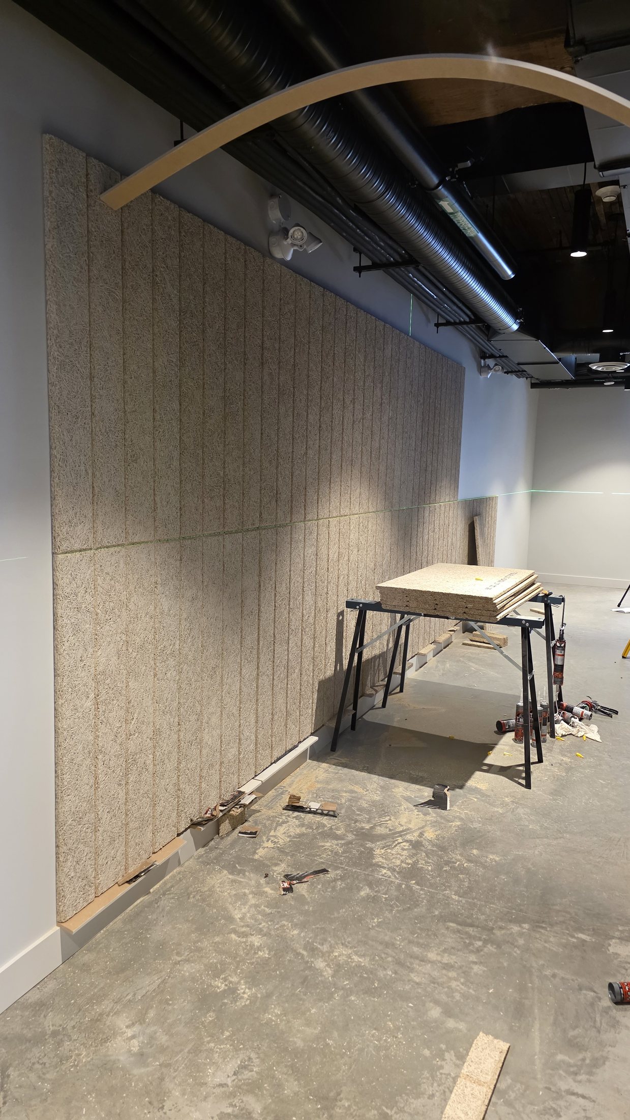 Close detail of aligned Tectum acoustic wall panels at 837 Beatty Street.