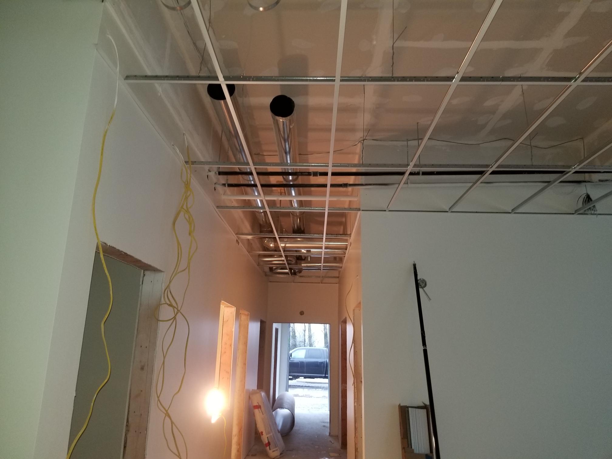 Chilliwack retail T-bar ceiling installation — archive view 2.
