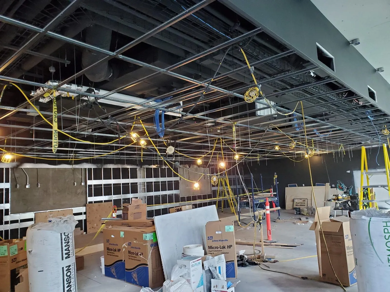 Bentall 3 black T-bar ceiling — supplied project archive view 1.