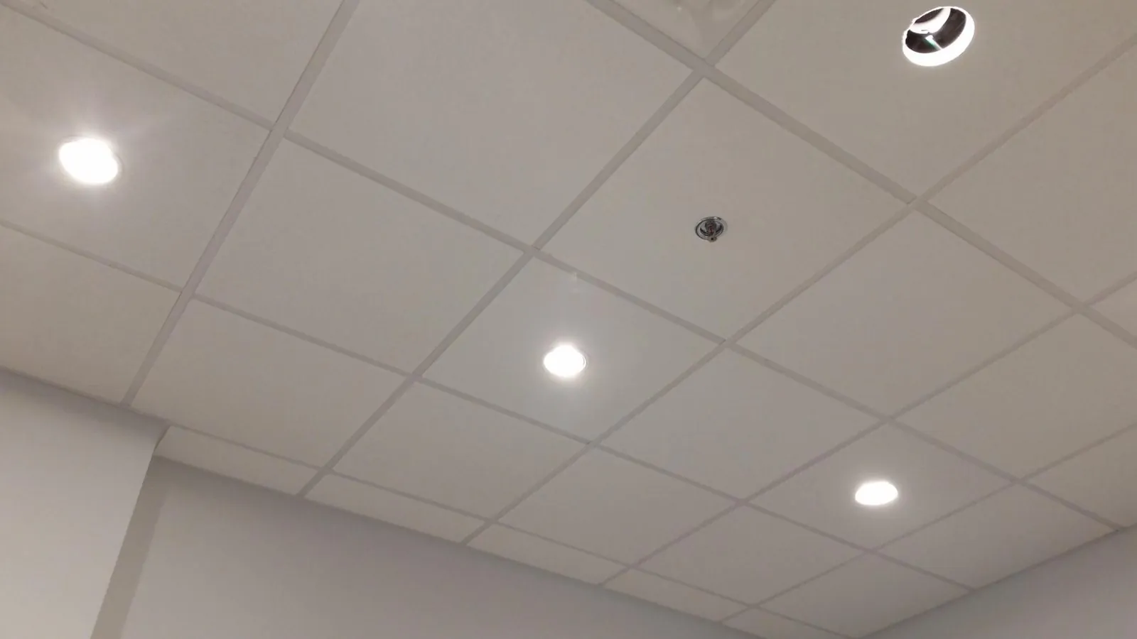 BMO downtown Vancouver T-bar and tile ceiling; actual Rambo project archive photograph