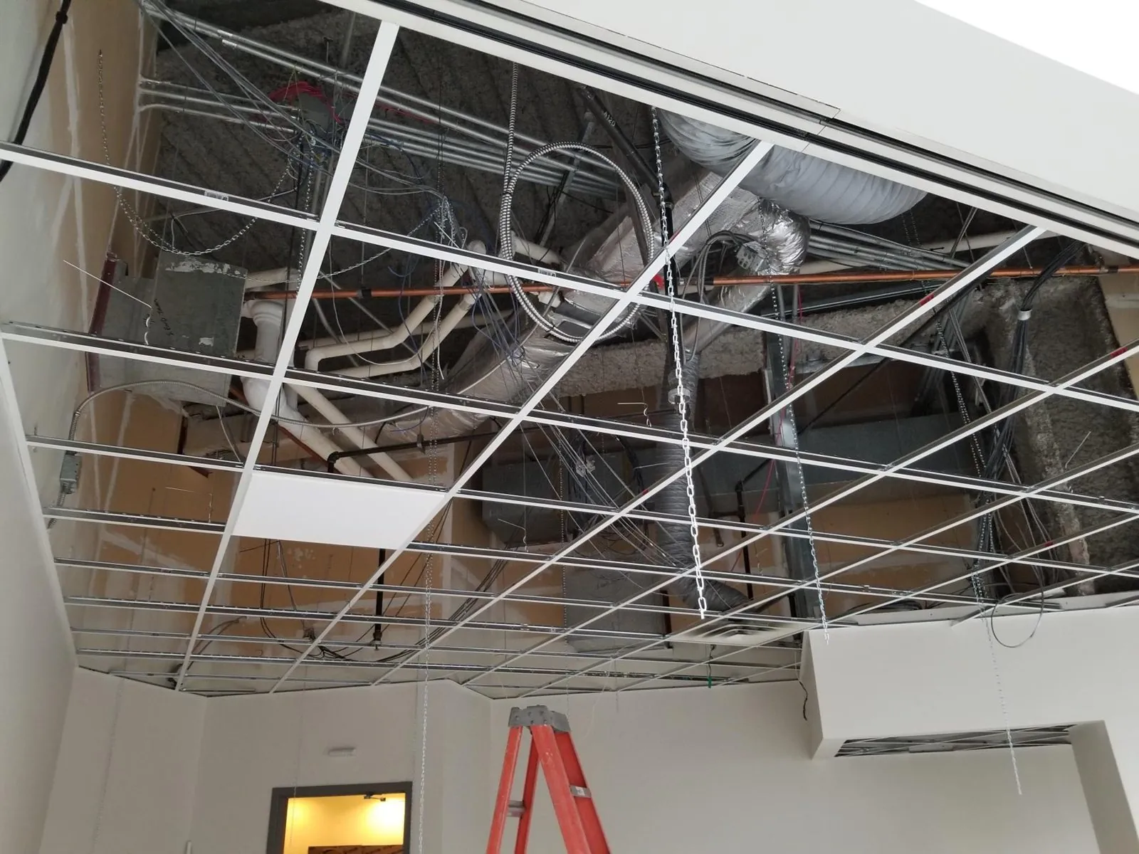 Canada Place upper office T-bar ceiling — supplied project archive view 1.