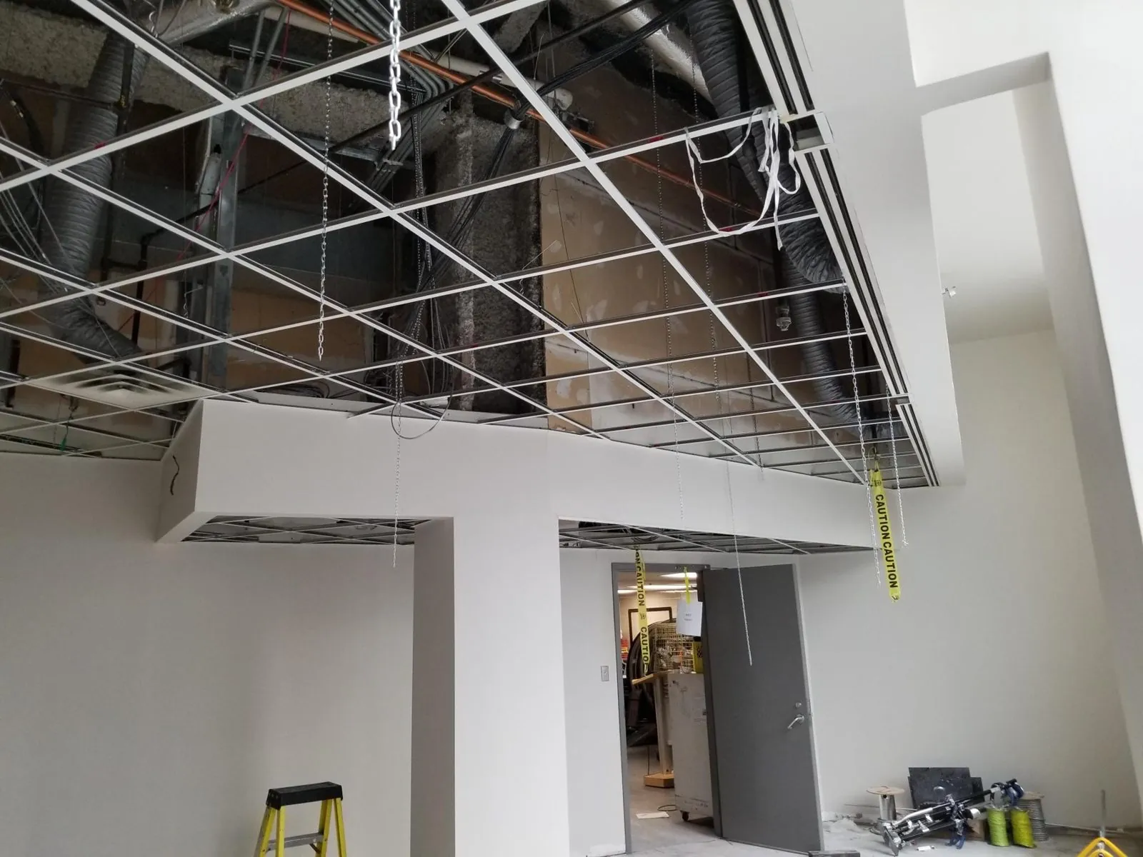 Canada Place upper office T-bar ceiling — supplied project archive view 2.