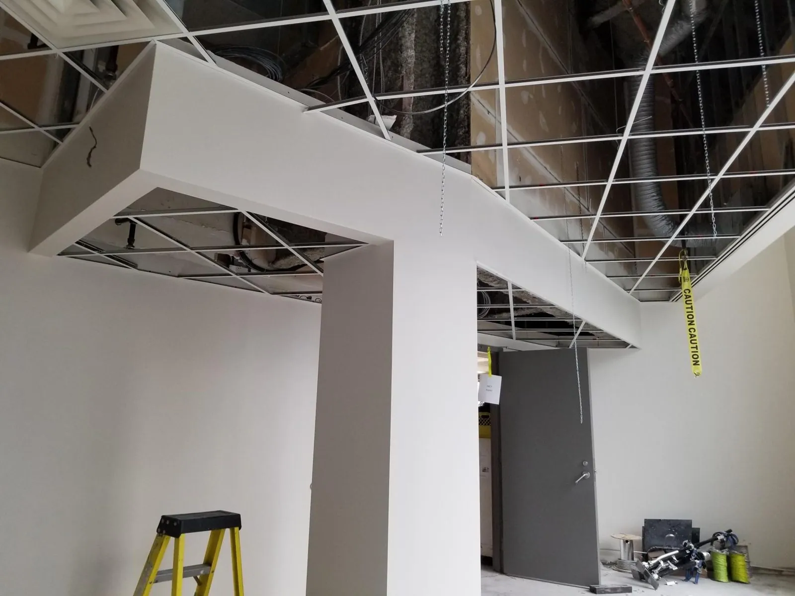 Canada Place upper office T-bar ceiling — supplied project archive view 3.