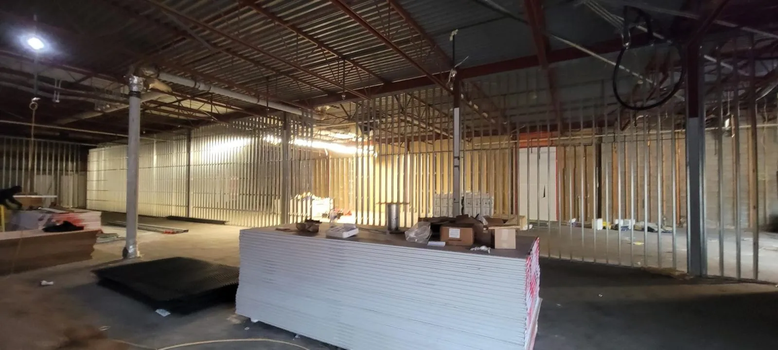Lynn Valley Centre demising wall framing — supplied project archive view 1.