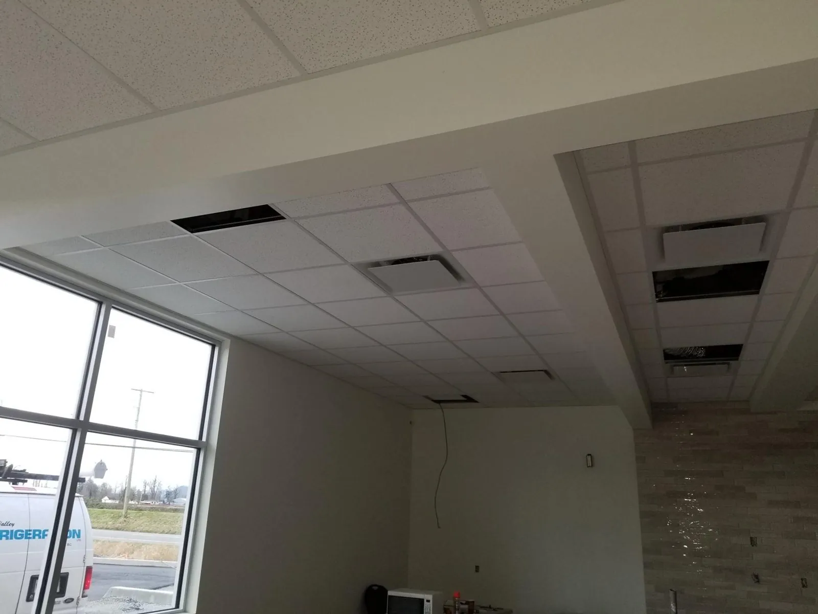 Tim Hortons Chilliwack ceiling tile installation — supplied project archive view 1.