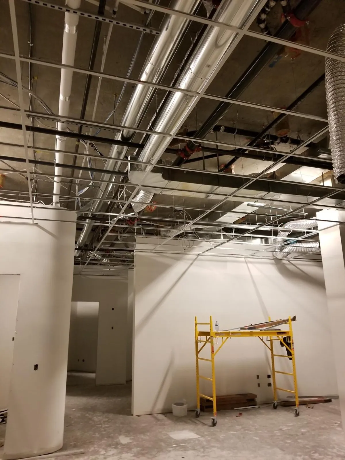 Vancouver office space T-bar installation — supplied project archive view 1.