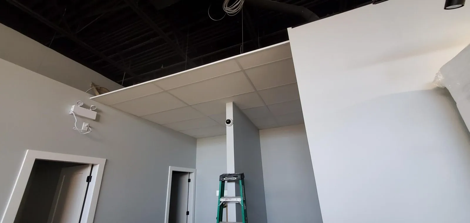 White Rock clinic ceiling: before and after — supplied project archive view 1.