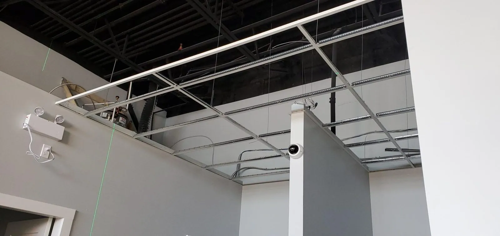 White Rock clinic ceiling: before and after — supplied project archive view 2.