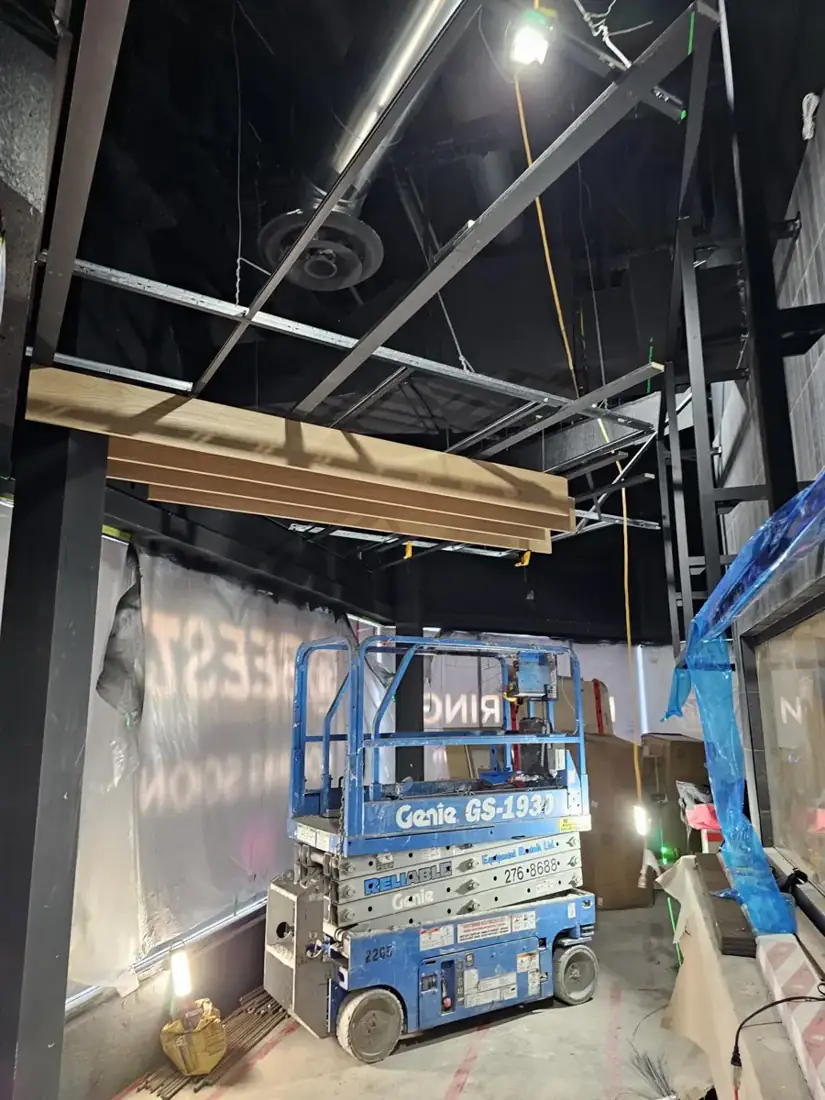 Installation-stage view of the restaurant ceiling feature.