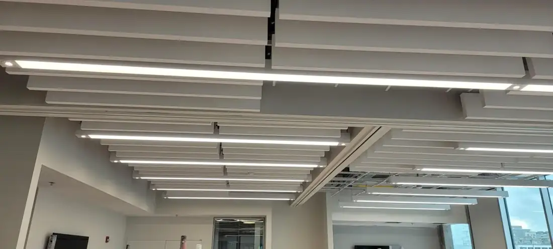 Baffle spacing around lighting and overhead services.