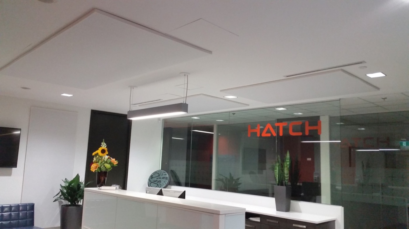 Hatch reception area showing suspended acoustic ceiling panels above the front desk.