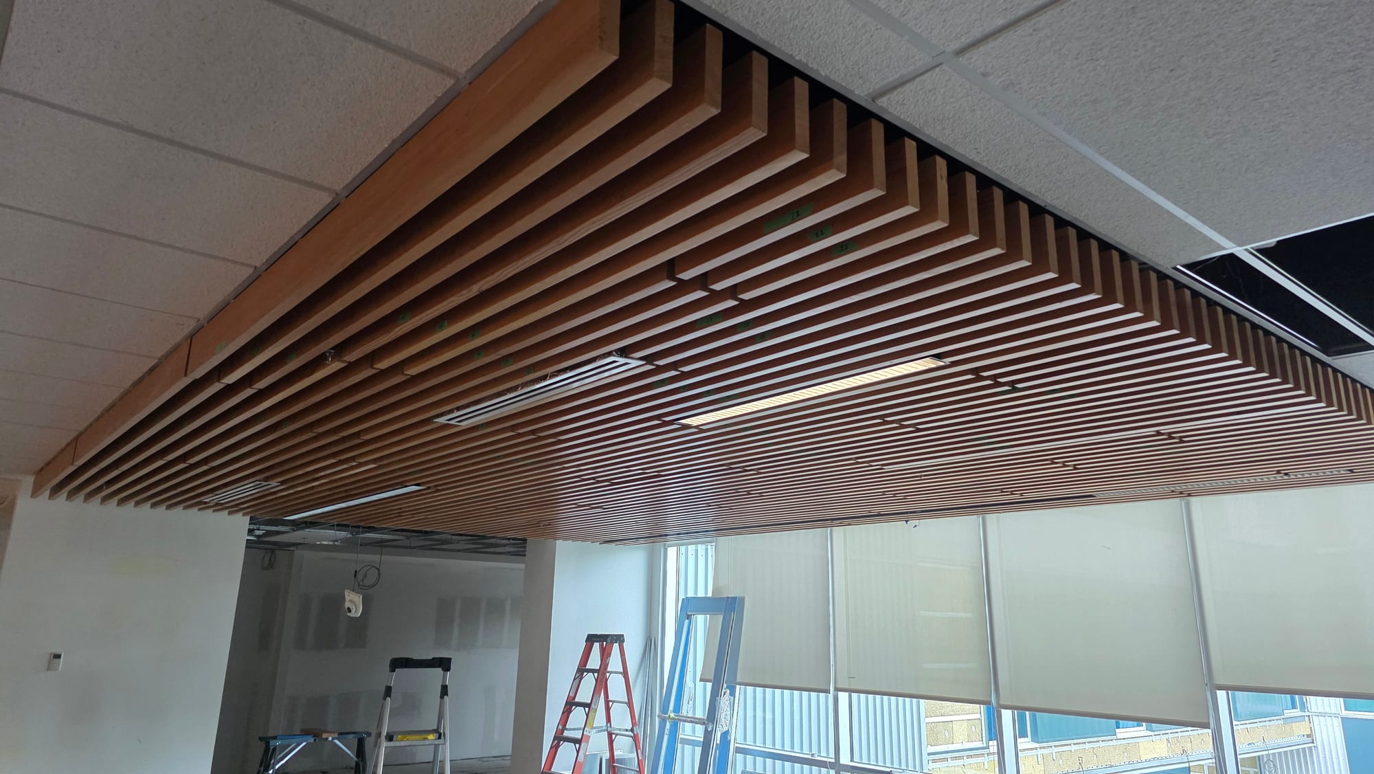 Wood-slat acoustic ceiling installed at Southpointe Academy.